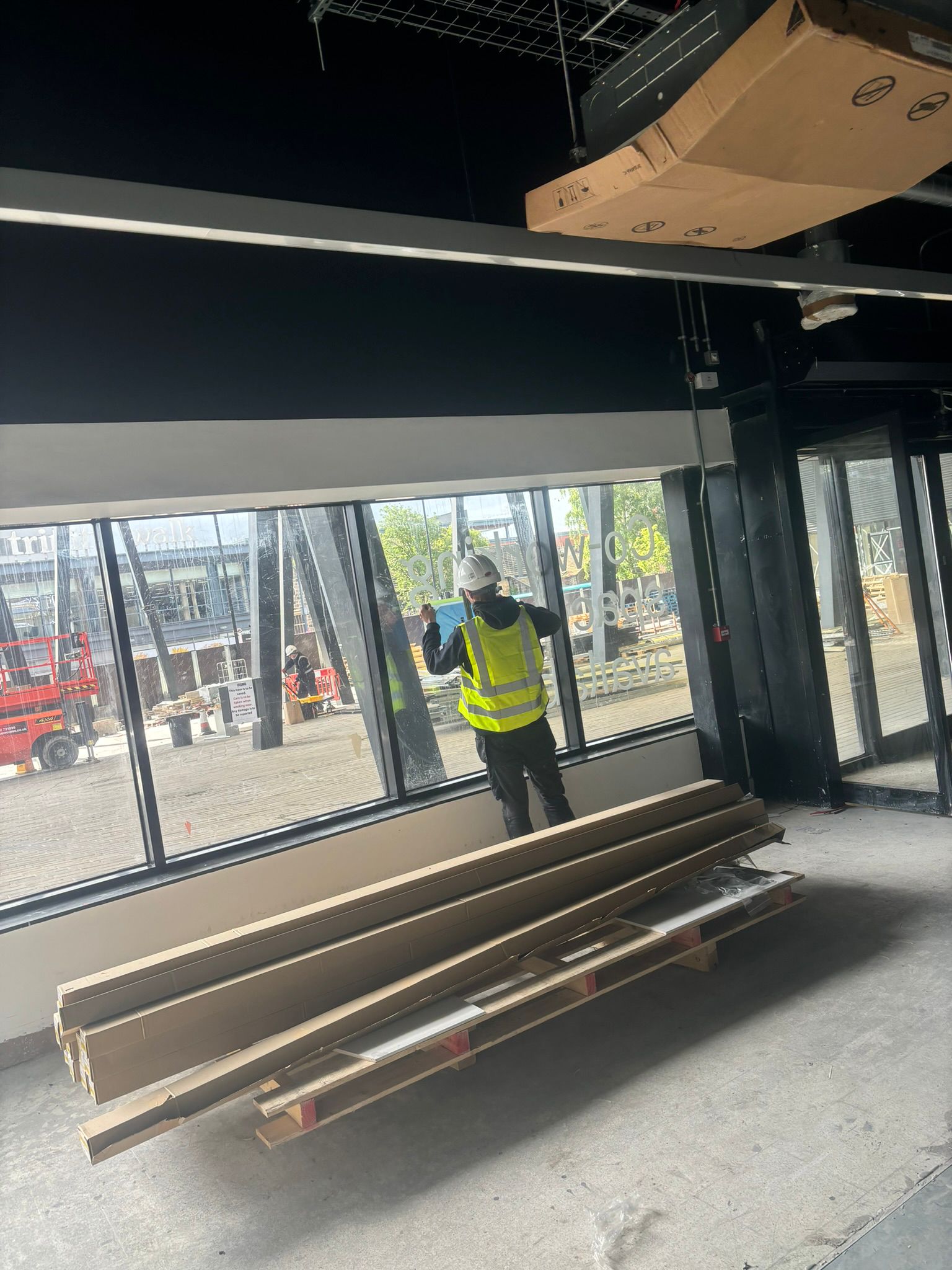 High-vis operator on commercial fit-out site