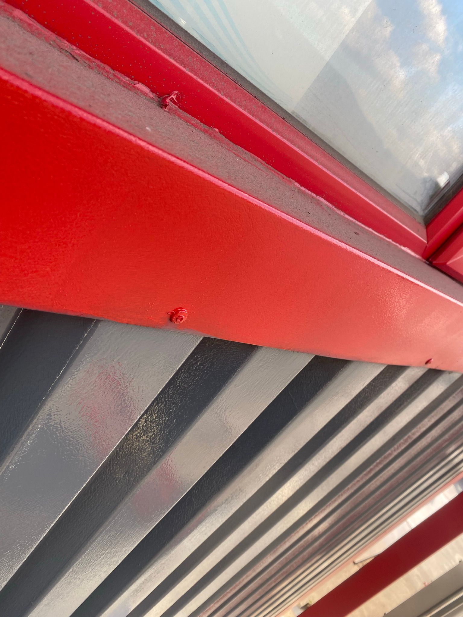 Red painted steel beam macro shot
